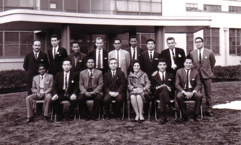 Artist Ahmed Madoun in front of the Japanese company Fujitsu in 1967
