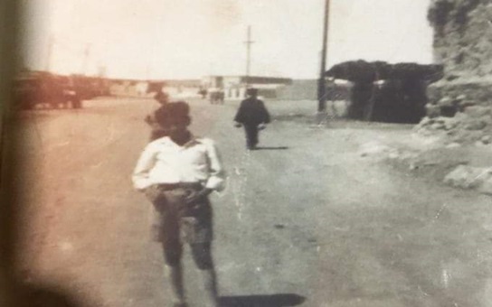 عبد العظيم العجيلي في شارع القوتلي - الرقة عام 1954
